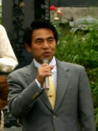 写真 挨拶する上田秀昭地元実行委員会委員長