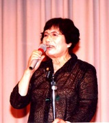 写真 全国交流会で挨拶する外尾静子さん